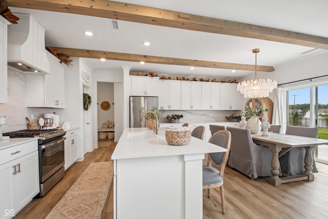19652 Shadow Trace Path, Westfield, IN 46074 - kitchen featuring appliances with stainless steel finishes, premium range hood, beam ceiling, recessed lighting, and tasteful backsplash