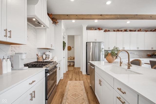 19652 Shadow Trace Path, Westfield, IN 46074 - kitchen featuring a sink, stainless steel appliances, custom exhaust hood, recessed lighting, and light countertops
