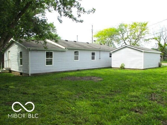 620 S 2nd St, Noblesville, IN 46060 - back of house featuring a lawn