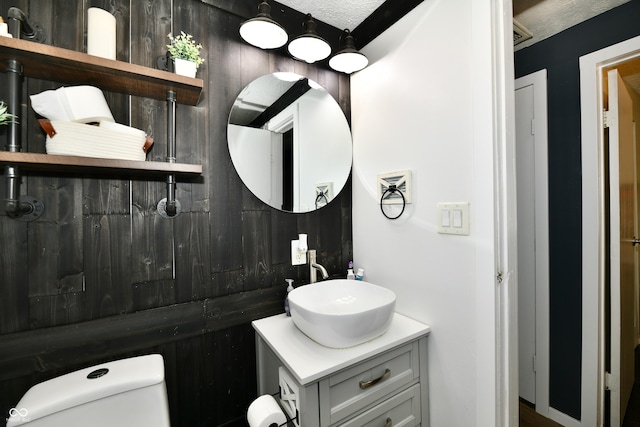 1445 Biloxi Ln, Beech Grove, IN 46107 - half bath with vanity and a textured ceiling