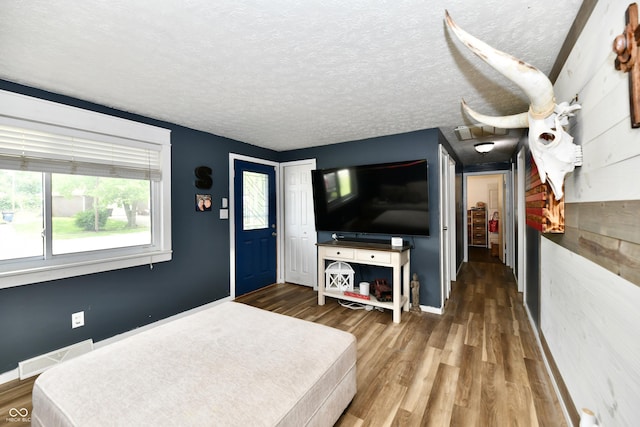 1445 Biloxi Ln, Beech Grove, IN 46107 - living room with wood finished floors and a textured ceiling