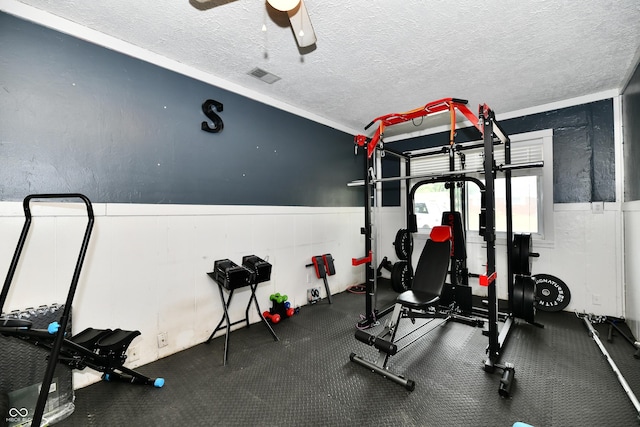1445 Biloxi Ln, Beech Grove, IN 46107 - workout area with a textured ceiling and a ceiling fan