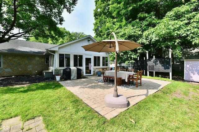 7242 Highburry Dr, Indianapolis, IN 46256 - rear view of house featuring stone siding and a patio