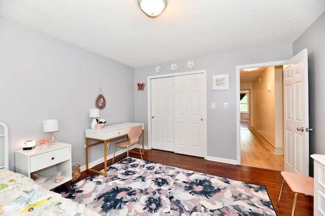 7242 Highburry Dr, Indianapolis, IN 46256 - bedroom featuring wood finished floors and a closet