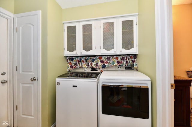 7242 Highburry Dr, Indianapolis, IN 46256 - laundry room with cabinet space and washer and dryer
