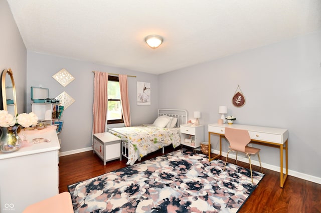 7242 Highburry Dr, Indianapolis, IN 46256 - bedroom featuring dark wood-style floors and baseboards