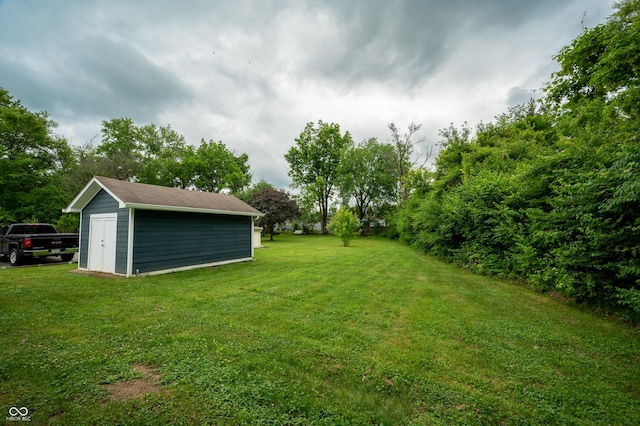 2159 W 58th St NW, Indianapolis, IN 46228 - view of grassy yard featuring a storage unit