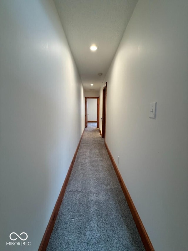 1421 S Meridian St, Indianapolis, IN 46225 - hall featuring light carpet, recessed lighting, and baseboards