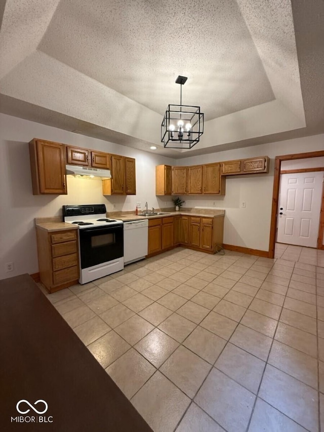 1421 S Meridian St, Indianapolis, IN 46225 - kitchen with electric range, under cabinet range hood, white dishwasher, a tray ceiling, and a chandelier
