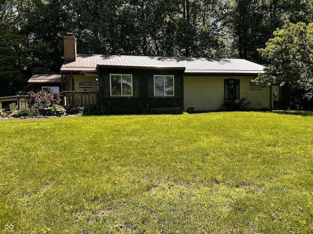 6758 S US Highway 63, Hillsdale, IN 47854 - ranch-style house with a chimney, a front lawn, and metal roof