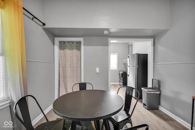 1141 N Shadeland Ave, Indianapolis, IN 46219 - dining room with light wood-style floors