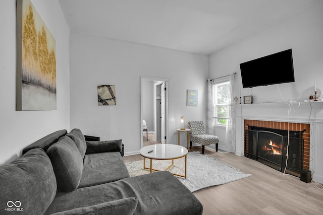 1141 N Shadeland Ave, Indianapolis, IN 46219 - living room with wood finished floors and a fireplace