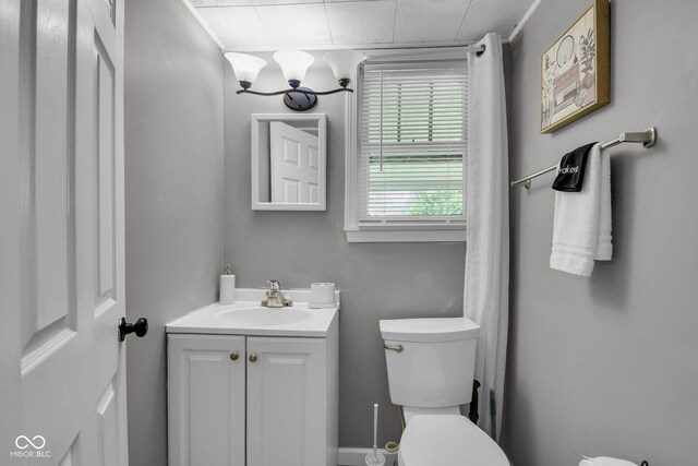 1141 N Shadeland Ave, Indianapolis, IN 46219 - bathroom featuring toilet and vanity