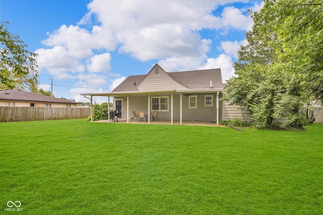 1141 N Shadeland Ave, Indianapolis, IN 46219 - back of property with a patio area and roof with shingles
