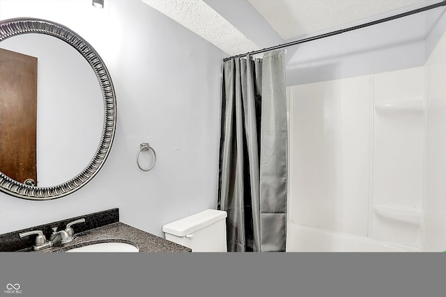 7504 Troon Ct, Indianapolis, IN 46237 - bathroom featuring shower / bath combination with curtain, vanity, toilet, and a textured ceiling