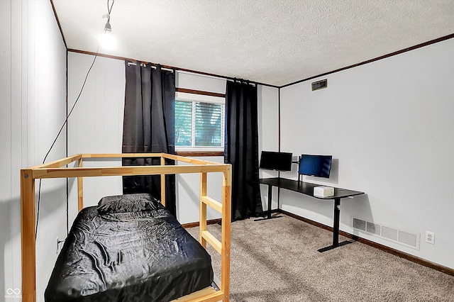 7504 Troon Ct, Indianapolis, IN 46237 - bedroom featuring a textured ceiling, carpet, and baseboards