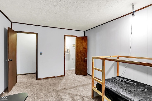 7504 Troon Ct, Indianapolis, IN 46237 - bedroom featuring ornamental molding, carpet flooring, a textured ceiling, and baseboards