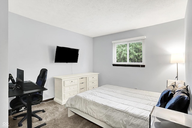7504 Troon Ct, Indianapolis, IN 46237 - bedroom with carpet floors, a textured ceiling, baseboards, and an office area