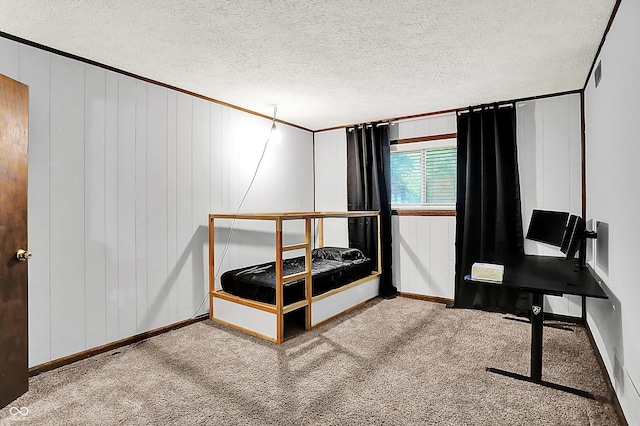 7504 Troon Ct, Indianapolis, IN 46237 - carpeted bedroom with baseboards, ornamental molding, and a textured ceiling