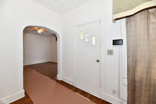 1346 W 27th St, Indianapolis, IN 46208 - hallway with arched walkways, wood finished floors, crown molding, and baseboards
