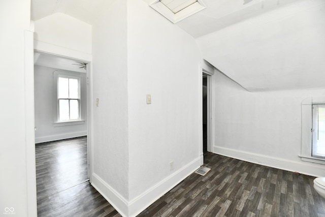 1346 W 27th St, Indianapolis, IN 46208 - bonus room featuring vaulted ceiling, dark wood-style flooring, and baseboards