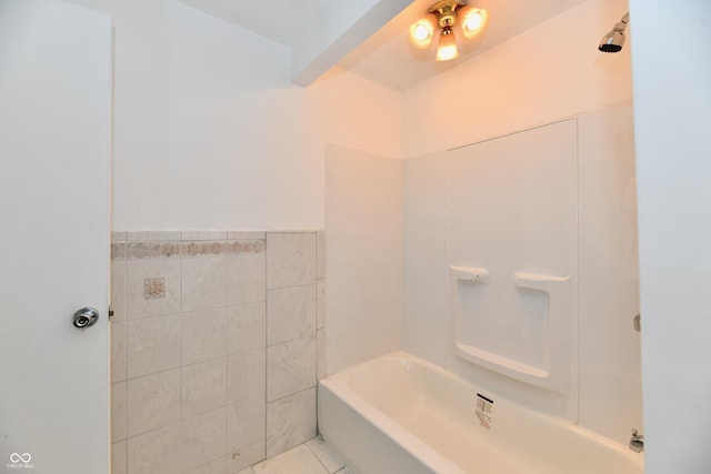 1346 W 27th St, Indianapolis, IN 46208 - bathroom with a bathtub, tile walls, and a shower