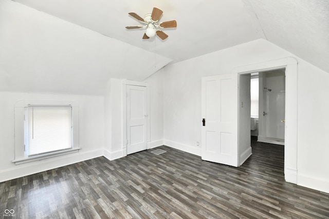 1346 W 27th St, Indianapolis, IN 46208 - additional living space featuring lofted ceiling, dark wood-type flooring, a ceiling fan, and baseboards