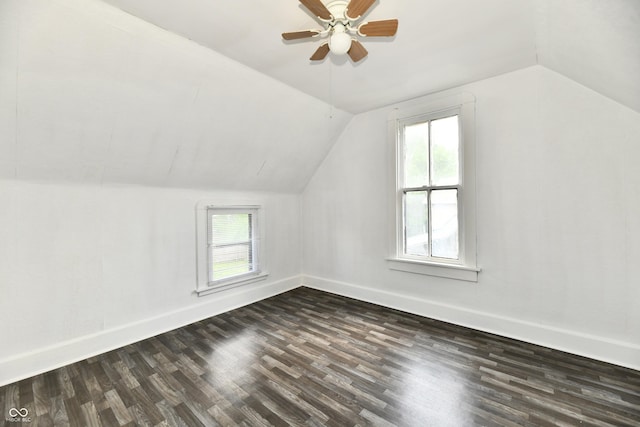 1346 W 27th St, Indianapolis, IN 46208 - additional living space featuring healthy amount of natural light, dark wood finished floors, vaulted ceiling, and baseboards