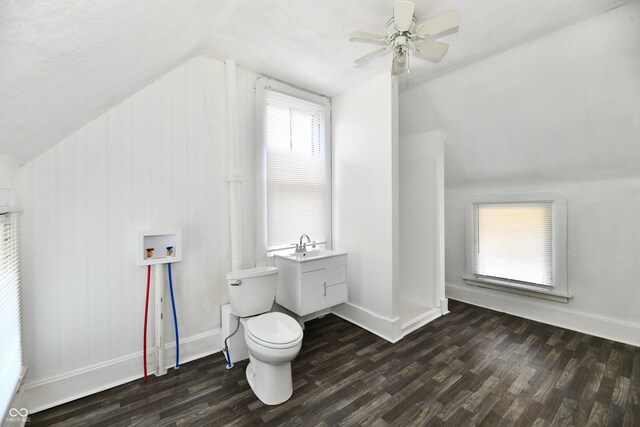 1346 W 27th St, Indianapolis, IN 46208 - full bathroom with lofted ceiling, wood finished floors, toilet, ceiling fan, and baseboards