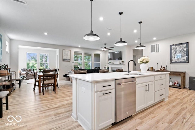 7154 Covington St, Lebanon, IN 46052 - kitchen with dishwasher, open floor plan, a sink, ceiling fan, and recessed lighting