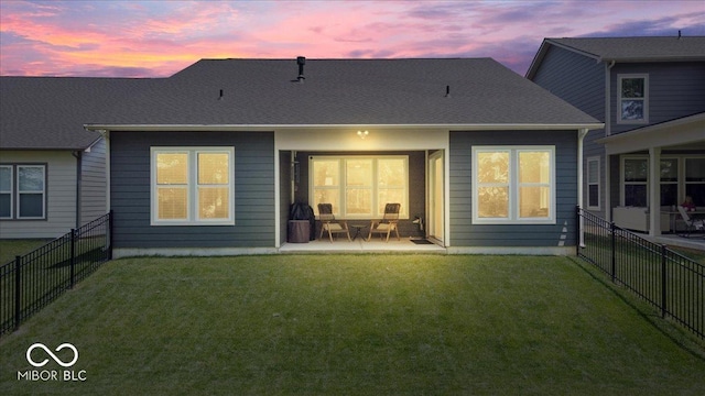 7154 Covington St, Lebanon, IN 46052 - back of house at dusk with a patio area