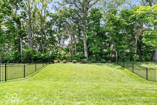 7154 Covington St, Lebanon, IN 46052 - view of yard featuring view of wooded area