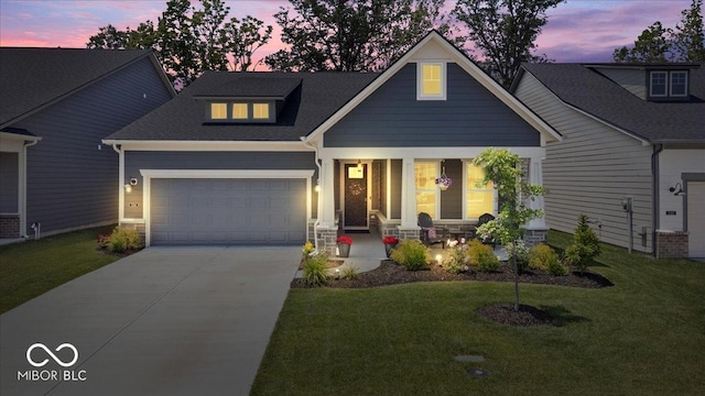 7154 Covington St, Lebanon, IN 46052 - craftsman inspired home with covered porch, a garage, driveway, a front yard, and a shingled roof