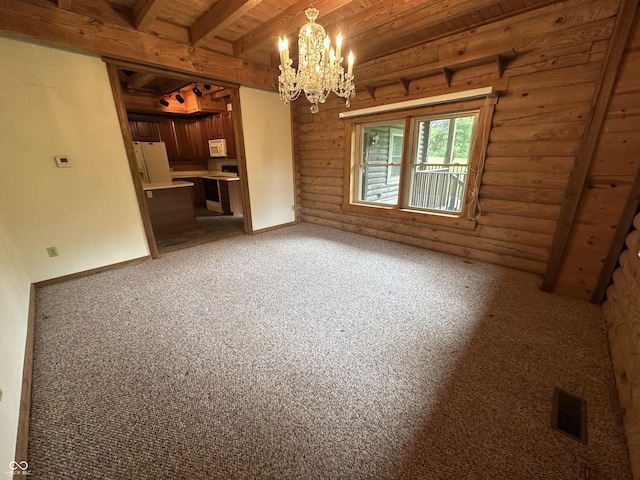 2858 N Stout Rd, Liberty, IN 47353 - unfurnished living room featuring a chandelier, light colored carpet, wood ceiling with exposed beams, and rustic walls