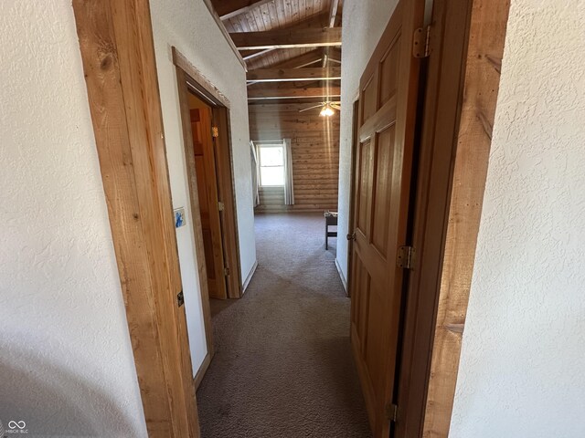 2858 N Stout Rd, Liberty, IN 47353 - hallway with carpet, a textured wall, and wood ceiling
