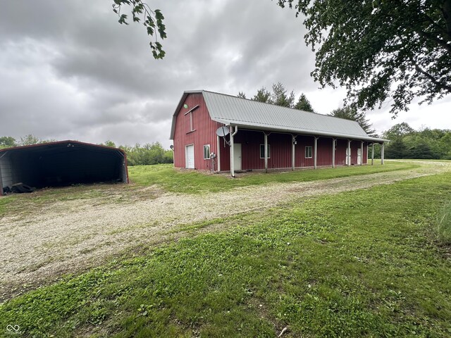 2858 N Stout Rd, Liberty, IN 47353 - view of pole building with a lawn and driveway