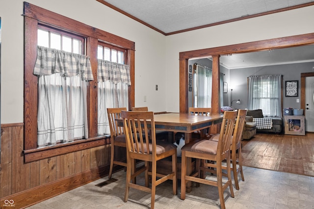 11780 S Hoover St, Clinton, IN 47842 - dining space featuring ornamental molding and wooden walls