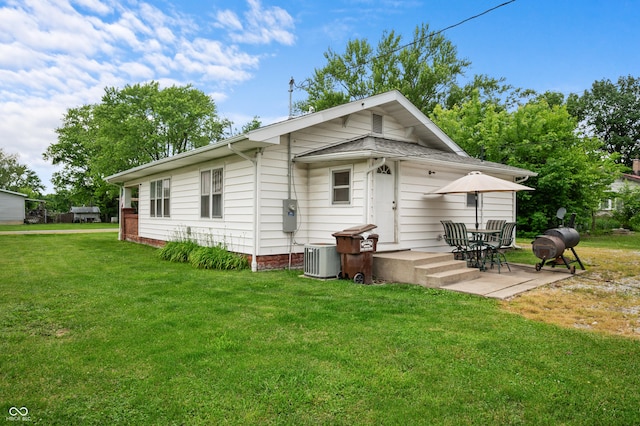 11780 S Hoover St, Clinton, IN 47842 - rear view of property with a lawn and central AC unit