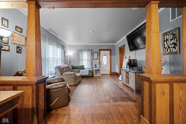 11780 S Hoover St, Clinton, IN 47842 - living area with dark wood-style floors, crown molding, and ornate columns