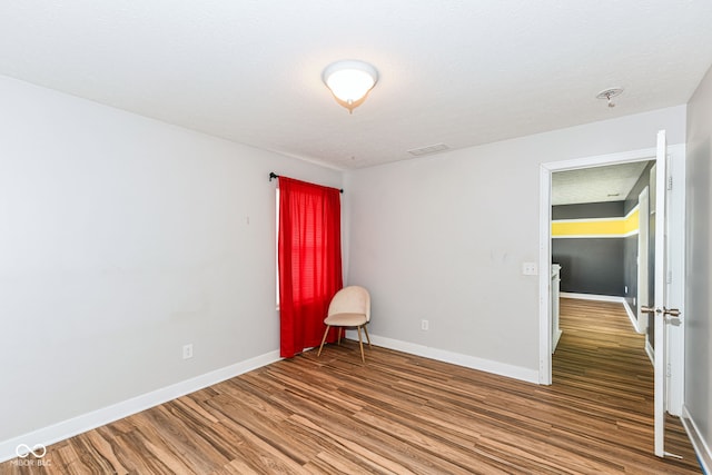 1217 Old Vines Trl, Greenwood, IN 46143 - empty room with wood finished floors and baseboards