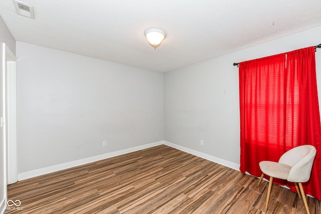 1217 Old Vines Trl, Greenwood, IN 46143 - spare room with wood finished floors and baseboards