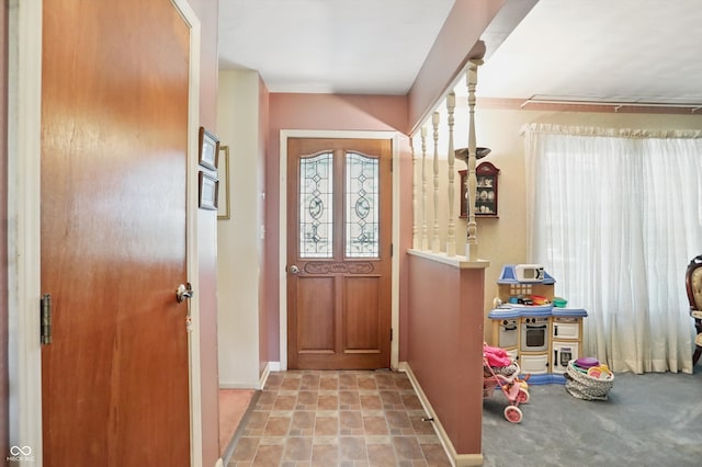 1914 S Avon Ave, Avon, IN 46123 - entrance foyer with baseboards and stone finish flooring