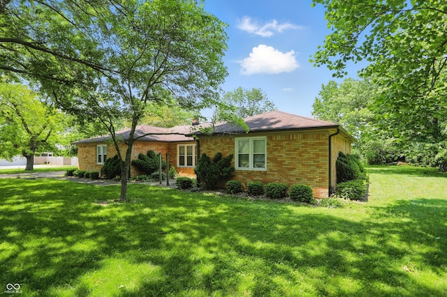 1914 S Avon Ave, Avon, IN 46123 - view of front of home featuring brick siding and a front lawn
