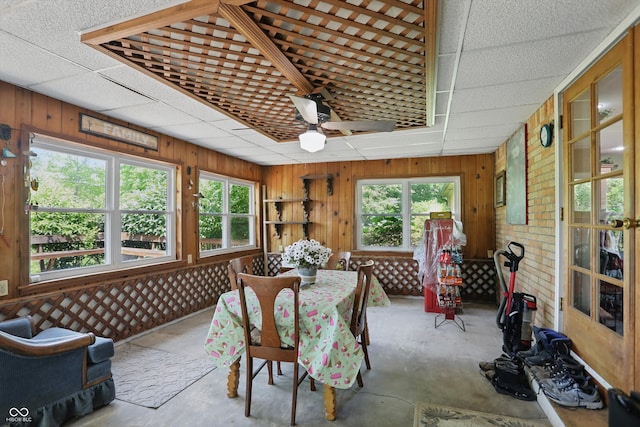1914 S Avon Ave, Avon, IN 46123 - sunroom / solarium featuring unfinished concrete floors, wooden walls, and a paneled ceiling