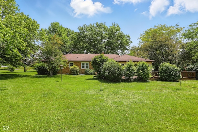 1914 S Avon Ave, Avon, IN 46123 - view of grassy yard with a deck