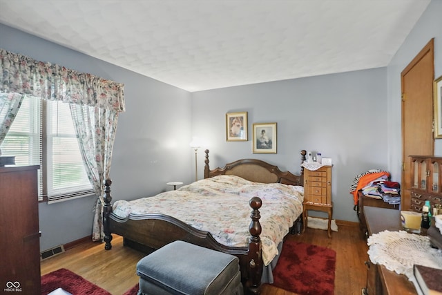 1914 S Avon Ave, Avon, IN 46123 - bedroom featuring wood finished floors and baseboards