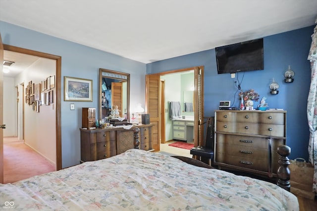 1914 S Avon Ave, Avon, IN 46123 - bedroom featuring carpet flooring, ensuite bathroom, and baseboards