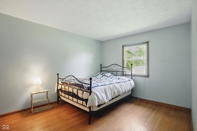 1914 S Avon Ave, Avon, IN 46123 - bedroom featuring wood finished floors and baseboards