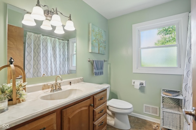 1914 S Avon Ave, Avon, IN 46123 - full bath featuring vanity, toilet, baseboards, and a shower with curtain