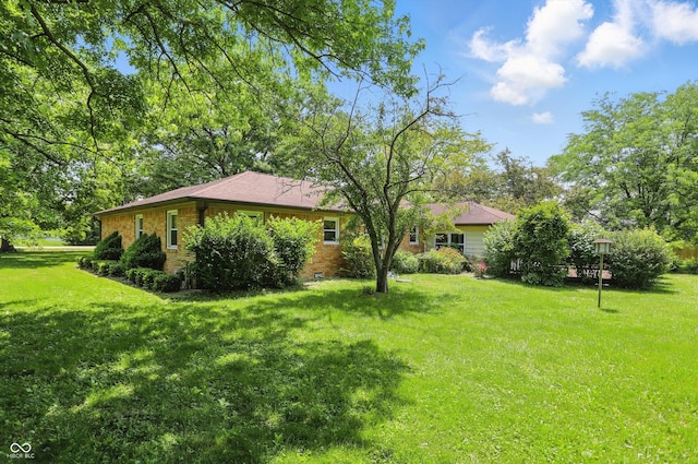 1914 S Avon Ave, Avon, IN 46123 - view of front of property featuring a front lawn and brick siding